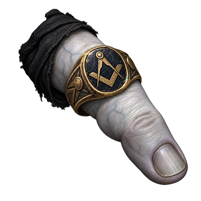 a very pale finger with a decorated ring